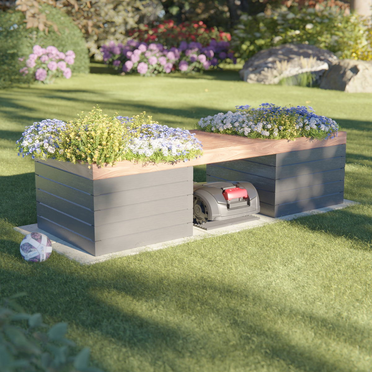 Modern dark gray planter box and robotic lawn mower garage with flowers on a green lawn