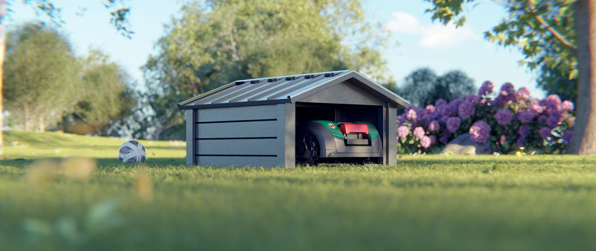 Detailed 3D rendering of a wooden DIY robot mower garage with a modern design, on a green lawn with a robot mower parked inside.